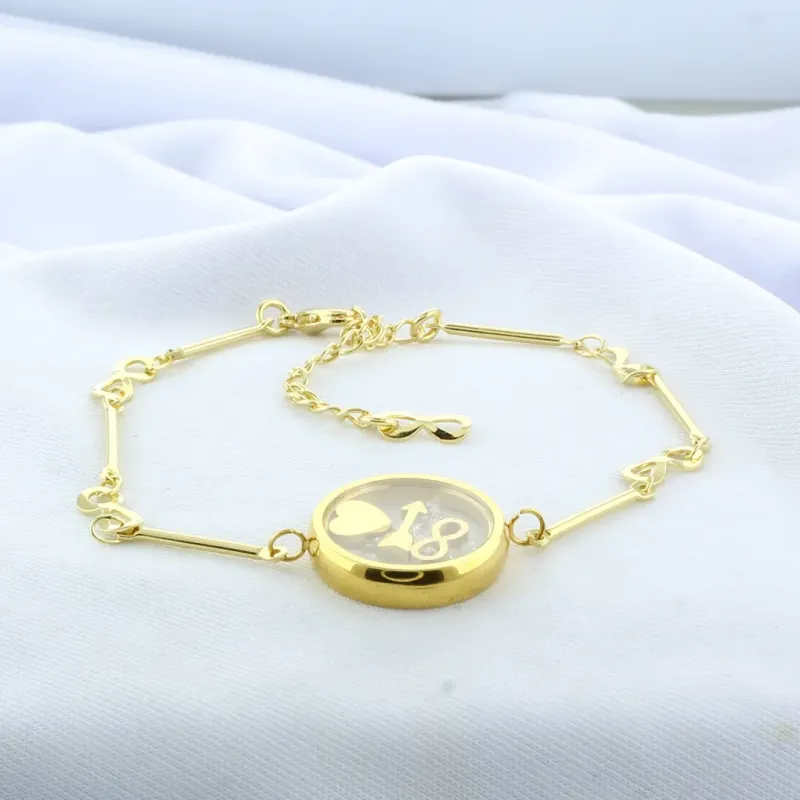 PULSEIRA COM SIMBOLOS DO INFINITO E  MANDALA COM ZIRCONIAS