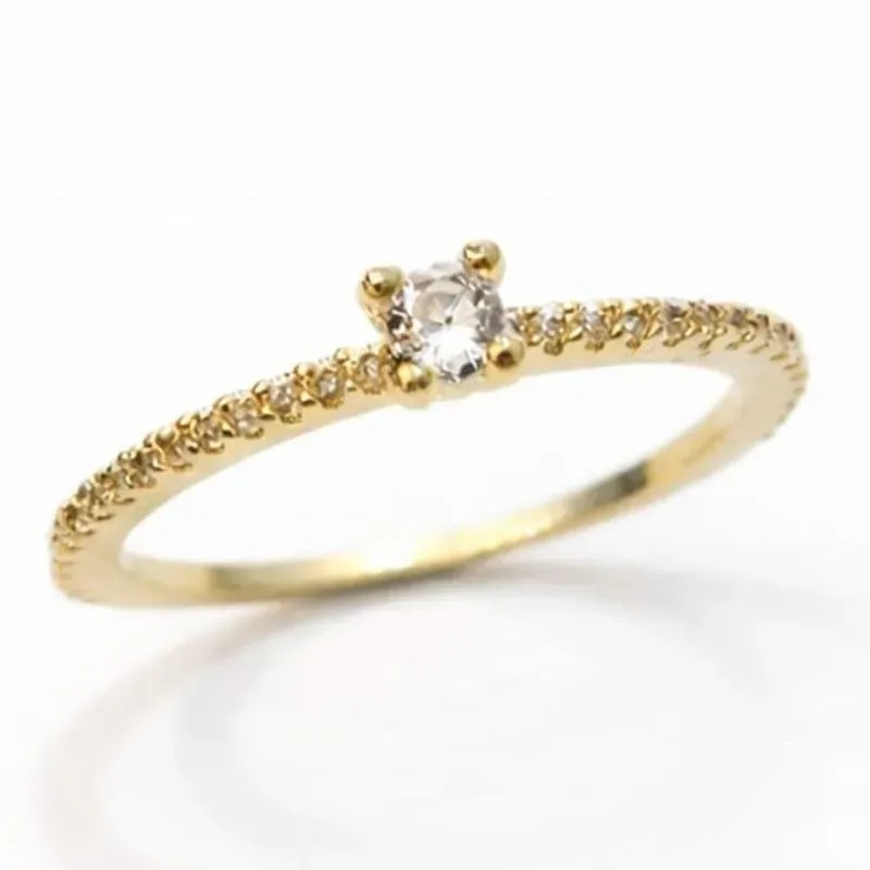 ANEL SOLITÁRIO CRAVEJADO PEDRA REDONDA 3MM