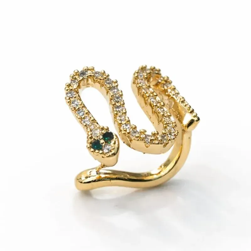 Piercing fake dourado em formato de cobra