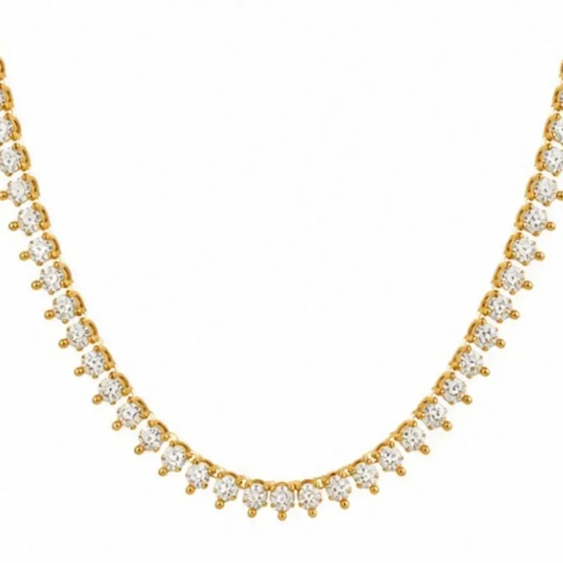 Colar Cravejado de Bolinhas Dourado com Pedras Brancas 40cm.