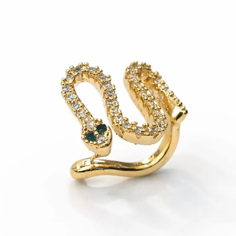 Piercing fake dourado em formato de cobra